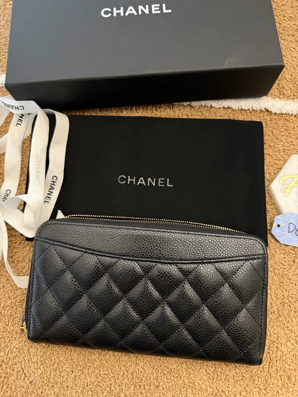 CHANEL Black Quilted Caviar Leather Zip Around Wallet with Gold CC
